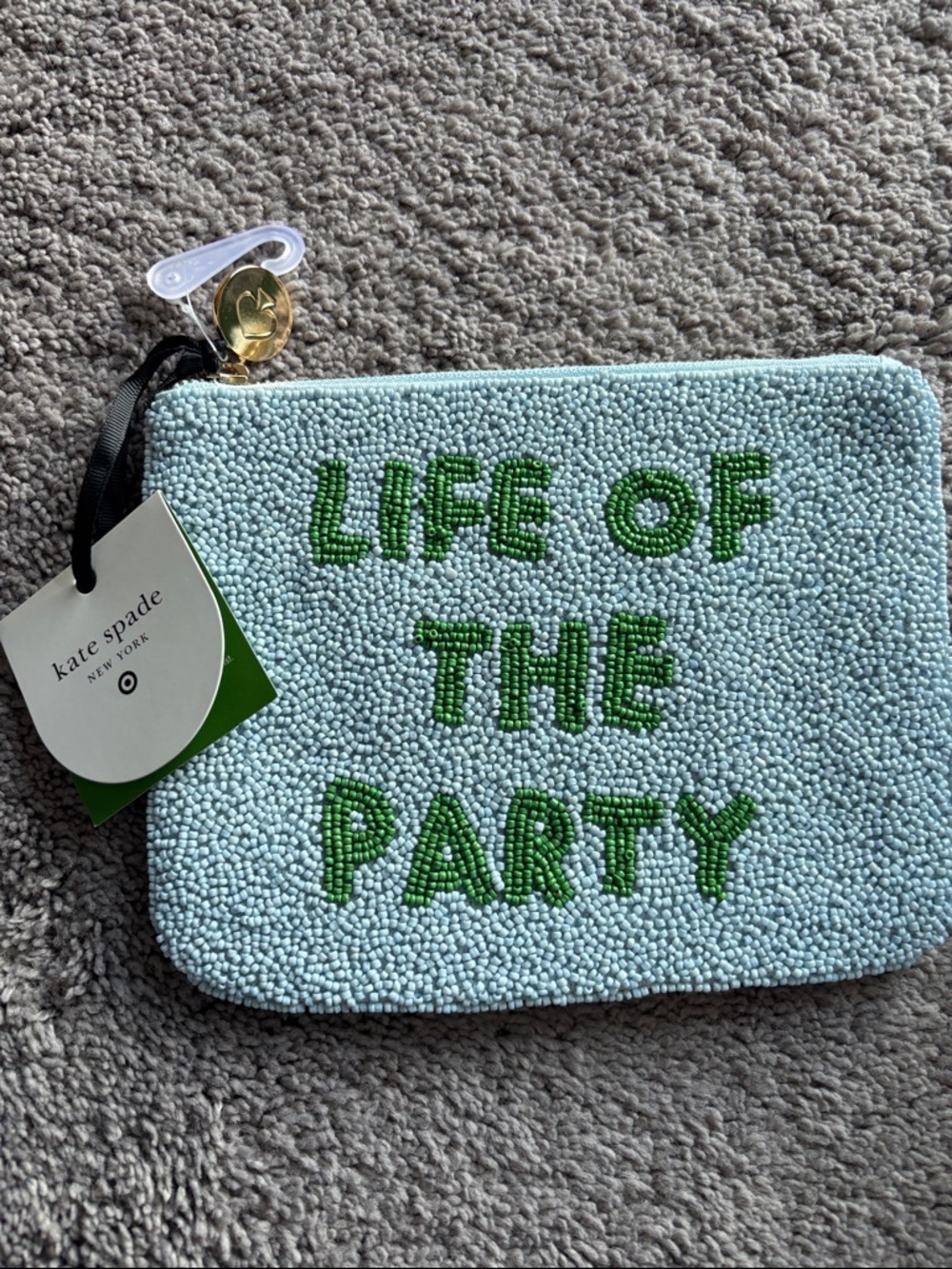 kate spade beaded pouch in light blue with green lettering